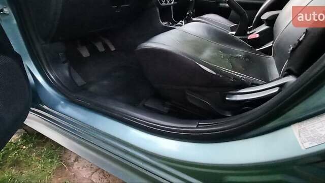 Зелений Міцубісі Lancer, об'ємом двигуна 2 л та пробігом 265 тис. км за 5100 $, фото 7 на Automoto.ua