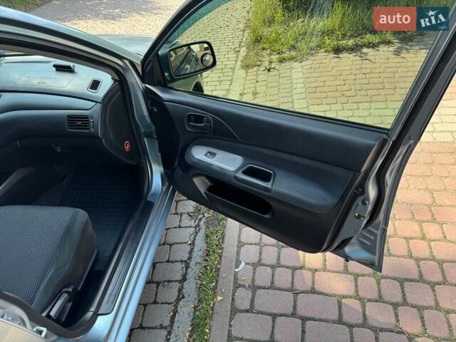 Зеленый Мицубиси Лансер, объемом двигателя 1.6 л и пробегом 137 тыс. км за 5500 $, фото 12 на Automoto.ua