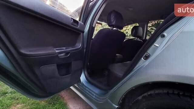 Зелений Міцубісі Lancer, об'ємом двигуна 2 л та пробігом 265 тис. км за 5100 $, фото 12 на Automoto.ua