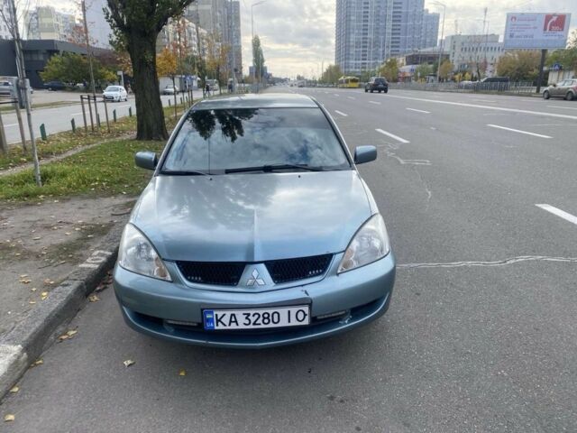Зеленый Мицубиси Лансер, объемом двигателя 1.6 л и пробегом 167 тыс. км за 3500 $, фото 1 на Automoto.ua