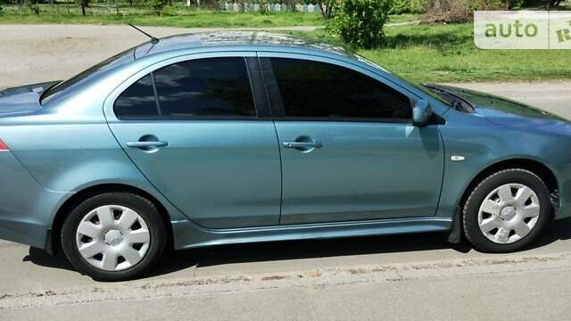 Зелений Міцубісі Lancer, об'ємом двигуна 1.5 л та пробігом 174 тис. км за 5599 $, фото 15 на Automoto.ua