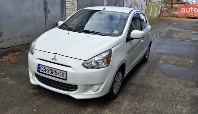 Білий Міцубісі Міраж, об'ємом двигуна 1.2 л та пробігом 177 тис. км за 5500 $, фото 1 на Automoto.ua