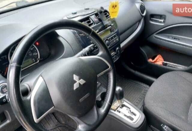 Белый Мицубиси Мираж, объемом двигателя 1.19 л и пробегом 148 тыс. км за 6550 $, фото 8 на Automoto.ua