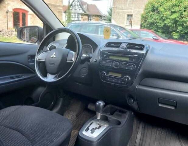 Белый Мицубиси Мираж, объемом двигателя 1.19 л и пробегом 148 тыс. км за 6550 $, фото 12 на Automoto.ua