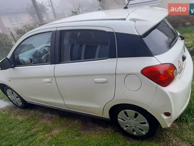 Белый Мицубиси Мираж, объемом двигателя 1.19 л и пробегом 148 тыс. км за 6550 $, фото 2 на Automoto.ua