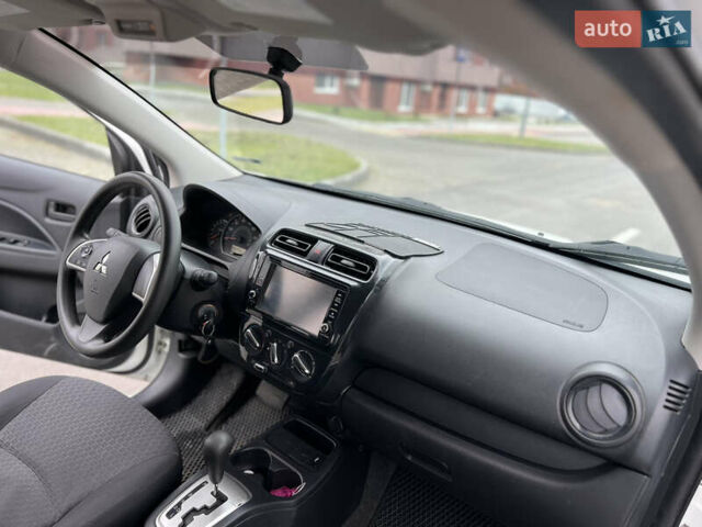 Білий Міцубісі Міраж, об'ємом двигуна 1.19 л та пробігом 61 тис. км за 7950 $, фото 15 на Automoto.ua