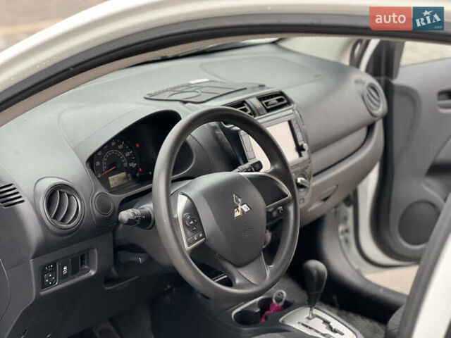 Білий Міцубісі Міраж, об'ємом двигуна 1.19 л та пробігом 61 тис. км за 7950 $, фото 14 на Automoto.ua