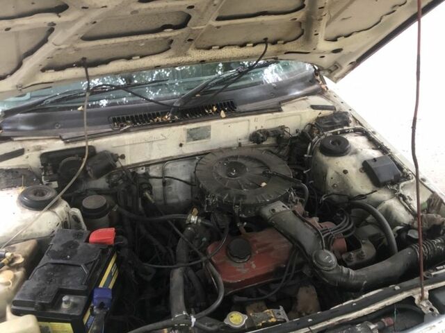 Белый Мицубиси Мираж, объемом двигателя 1.3 л и пробегом 283 тыс. км за 350 $, фото 4 на Automoto.ua