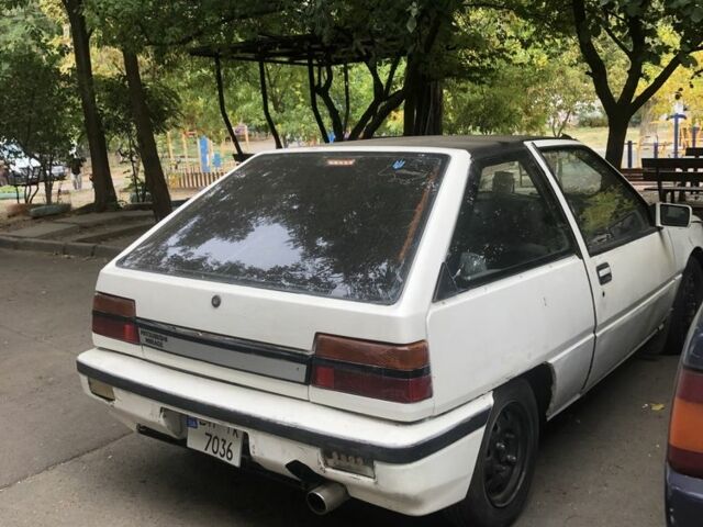 Белый Мицубиси Мираж, объемом двигателя 1.3 л и пробегом 283 тыс. км за 350 $, фото 1 на Automoto.ua