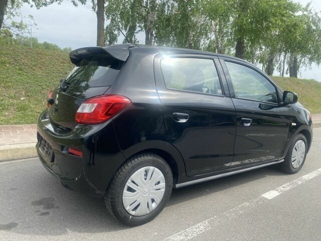 Черный Мицубиси Мираж, объемом двигателя 1.2 л и пробегом 40 тыс. км за 9450 $, фото 12 на Automoto.ua