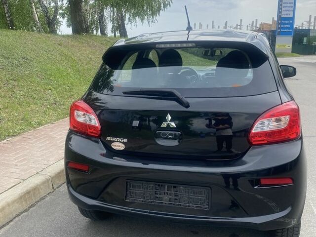 Черный Мицубиси Мираж, объемом двигателя 1.2 л и пробегом 40 тыс. км за 9450 $, фото 7 на Automoto.ua