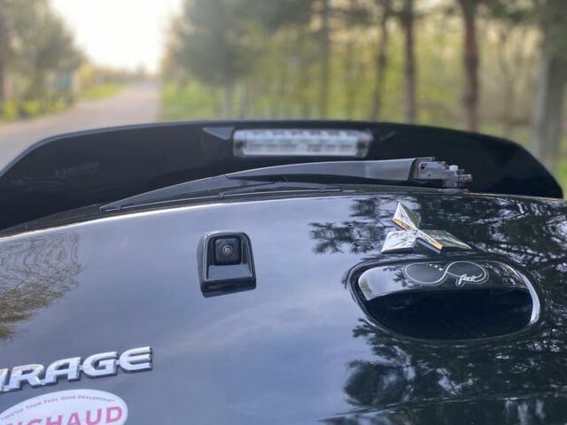 Черный Мицубиси Мираж, объемом двигателя 1.2 л и пробегом 40 тыс. км за 9450 $, фото 22 на Automoto.ua