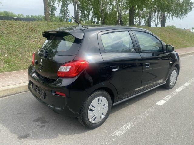 Черный Мицубиси Мираж, объемом двигателя 1.2 л и пробегом 40 тыс. км за 9450 $, фото 11 на Automoto.ua