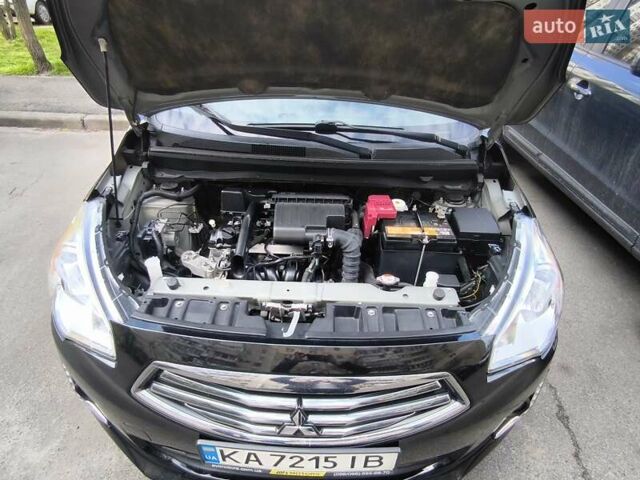 Чорний Міцубісі Міраж, об'ємом двигуна 1.2 л та пробігом 76 тис. км за 9495 $, фото 26 на Automoto.ua
