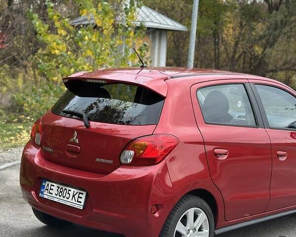 Красный Мицубиси Мираж, объемом двигателя 1.2 л и пробегом 102 тыс. км за 6900 $, фото 3 на Automoto.ua