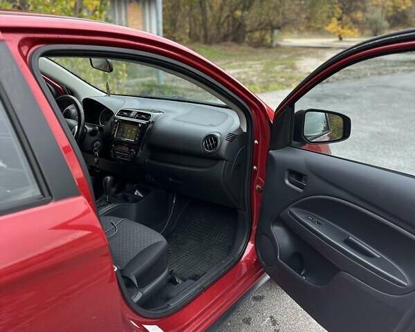 Красный Мицубиси Мираж, объемом двигателя 1.2 л и пробегом 102 тыс. км за 6900 $, фото 6 на Automoto.ua