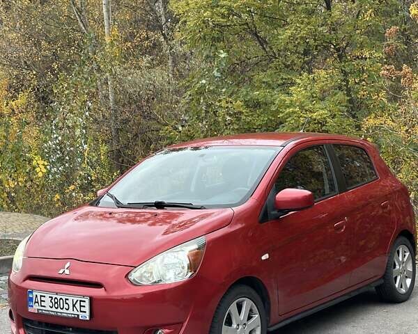 Красный Мицубиси Мираж, объемом двигателя 1.2 л и пробегом 102 тыс. км за 6900 $, фото 1 на Automoto.ua