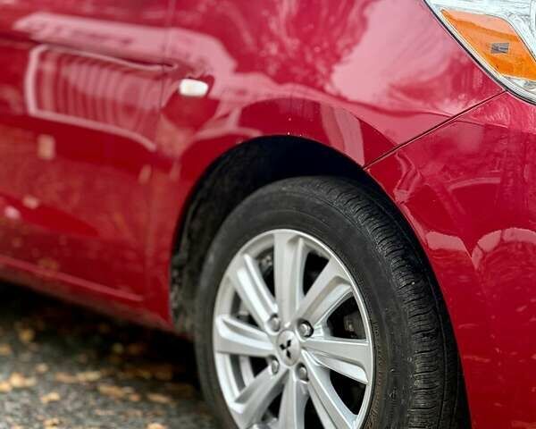 Красный Мицубиси Мираж, объемом двигателя 1.2 л и пробегом 60 тыс. км за 8500 $, фото 6 на Automoto.ua