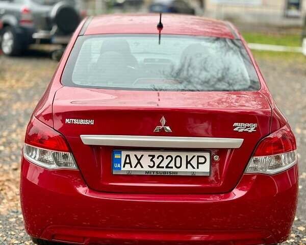 Красный Мицубиси Мираж, объемом двигателя 1.2 л и пробегом 60 тыс. км за 8500 $, фото 12 на Automoto.ua