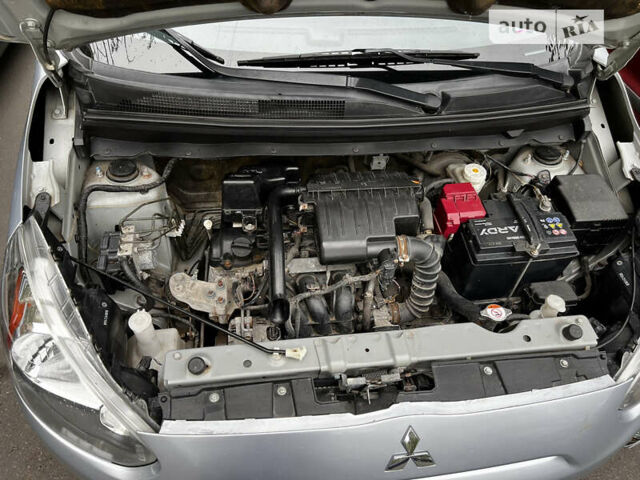 Серый Мицубиси Мираж, объемом двигателя 1.19 л и пробегом 64 тыс. км за 7000 $, фото 23 на Automoto.ua