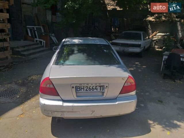 Серый Мицубиси Мираж, объемом двигателя 1.5 л и пробегом 280 тыс. км за 2700 $, фото 9 на Automoto.ua