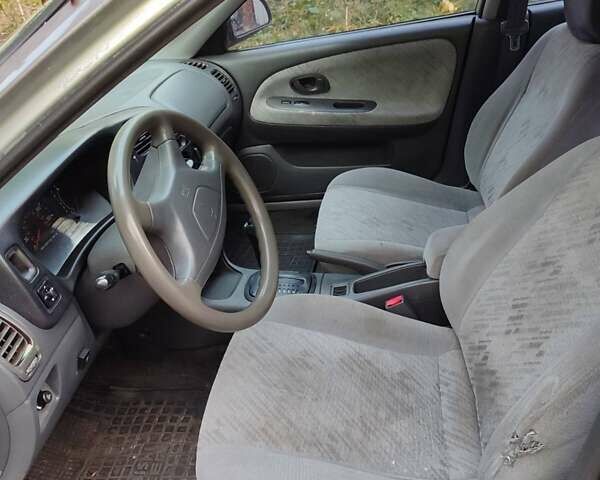 Сірий Міцубісі Міраж, об'ємом двигуна 1.8 л та пробігом 210 тис. км за 1850 $, фото 2 на Automoto.ua