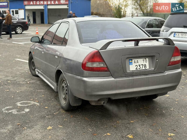 Серый Мицубиси Мираж, объемом двигателя 1.8 л и пробегом 300 тыс. км за 2100 $, фото 5 на Automoto.ua