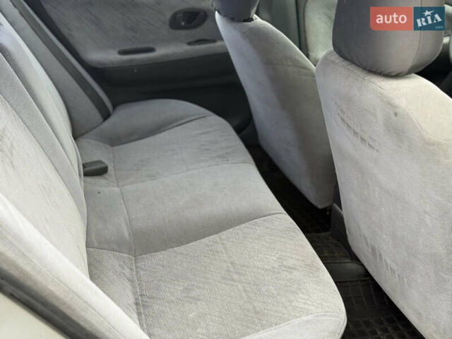 Серый Мицубиси Мираж, объемом двигателя 1.8 л и пробегом 300 тыс. км за 2100 $, фото 3 на Automoto.ua