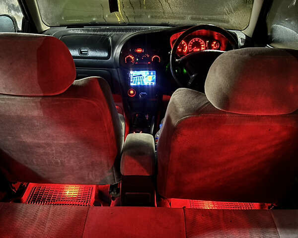 Мицубиси Мираж 1997 в Одессе на Automoto.ua Зеленый Мицубиси Мираж, объемом двигателя 1.47 л и пробегом 439 тыс. км за 3300 $, фото 13 на Automoto.ua