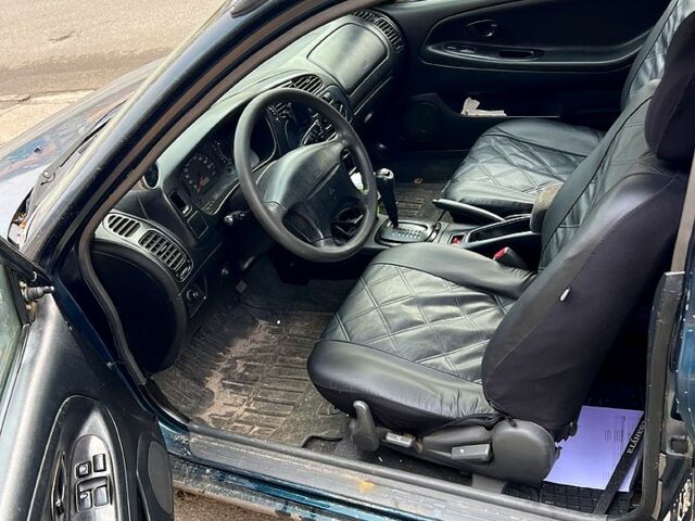 Зеленый Мицубиси Мираж, объемом двигателя 1.5 л и пробегом 165 тыс. км за 1900 $, фото 6 на Automoto.ua