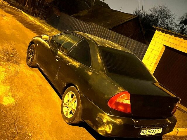 Зеленый Мицубиси Мираж, объемом двигателя 1.5 л и пробегом 165 тыс. км за 1900 $, фото 1 на Automoto.ua