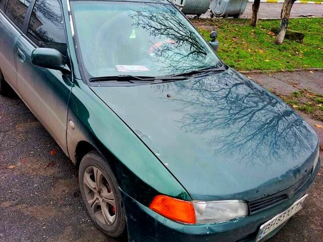 Зелений Міцубісі Міраж, об'ємом двигуна 1.6 л та пробігом 340 тис. км за 2850 $, фото 4 на Automoto.ua