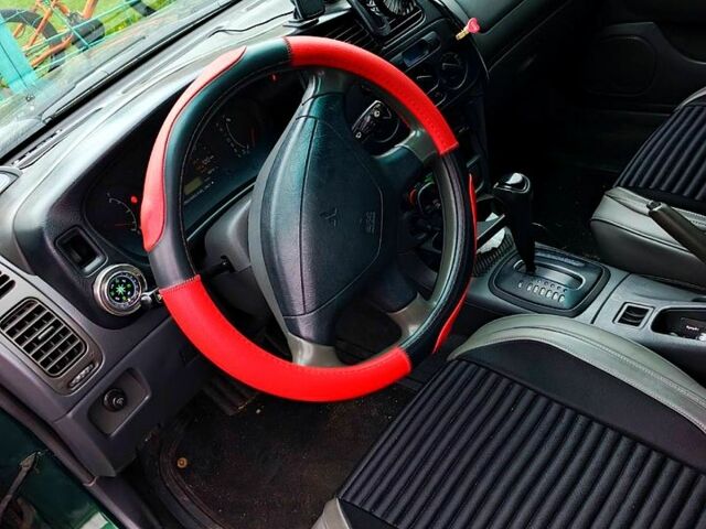 Зелений Міцубісі Міраж, об'ємом двигуна 1.6 л та пробігом 340 тис. км за 2850 $, фото 3 на Automoto.ua