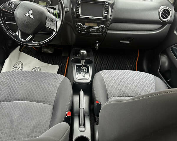 Помаранчевий Міцубісі Міраж, об'ємом двигуна 1.2 л та пробігом 110 тис. км за 6800 $, фото 9 на Automoto.ua