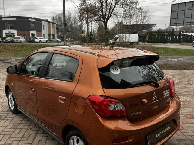 Помаранчевий Міцубісі Міраж, об'ємом двигуна 1.2 л та пробігом 110 тис. км за 6800 $, фото 7 на Automoto.ua