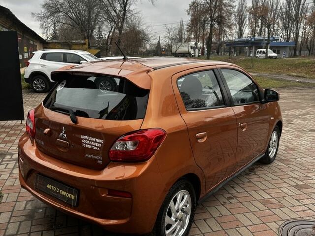 Помаранчевий Міцубісі Міраж, об'ємом двигуна 1.2 л та пробігом 110 тис. км за 6800 $, фото 6 на Automoto.ua