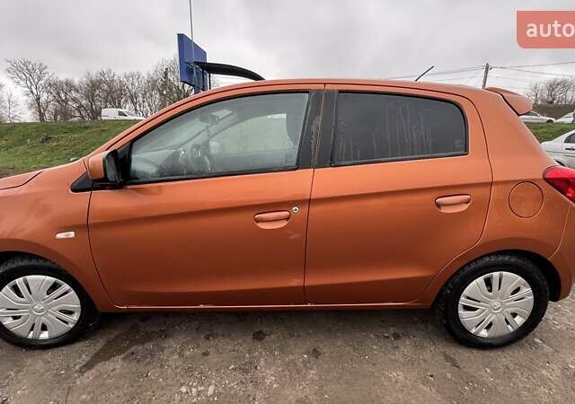 Оранжевый Мицубиси Мираж, объемом двигателя 1.2 л и пробегом 108 тыс. км за 7200 $, фото 1 на Automoto.ua