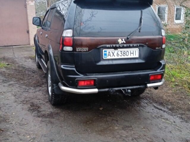 Черный Мицубиси Монтеро, объемом двигателя 2.5 л и пробегом 207 тыс. км за 7000 $, фото 2 на Automoto.ua