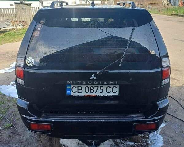 Черный Мицубиси Монтеро, объемом двигателя 3 л и пробегом 100 тыс. км за 11000 $, фото 1 на Automoto.ua