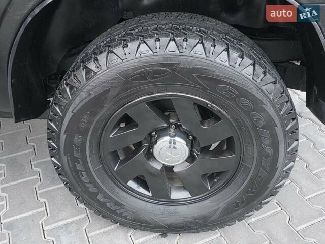 Красный Мицубиси Монтеро, объемом двигателя 3 л и пробегом 155 тыс. км за 5333 $, фото 22 на Automoto.ua