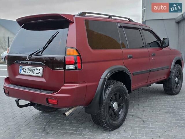 Красный Мицубиси Монтеро, объемом двигателя 3 л и пробегом 155 тыс. км за 5333 $, фото 3 на Automoto.ua
