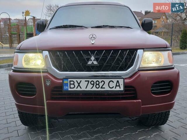 Красный Мицубиси Монтеро, объемом двигателя 3 л и пробегом 155 тыс. км за 5333 $, фото 4 на Automoto.ua