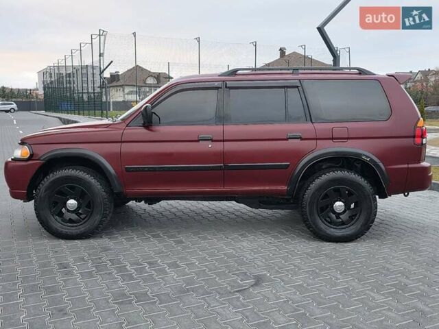 Красный Мицубиси Монтеро, объемом двигателя 3 л и пробегом 155 тыс. км за 5333 $, фото 7 на Automoto.ua