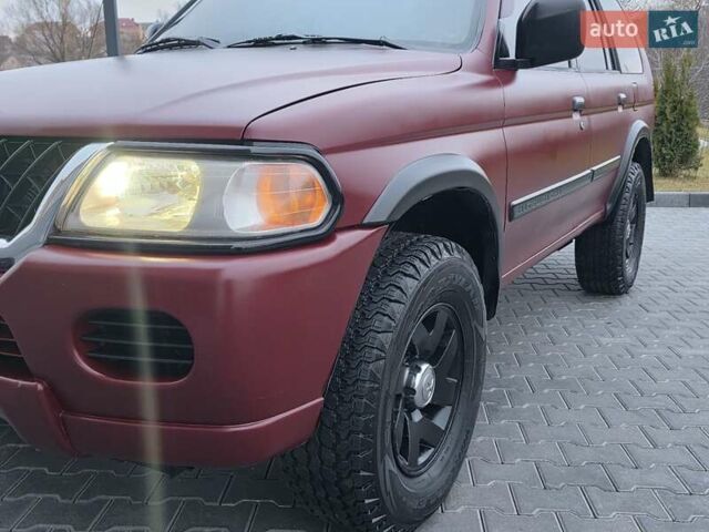 Красный Мицубиси Монтеро, объемом двигателя 3 л и пробегом 155 тыс. км за 5333 $, фото 15 на Automoto.ua