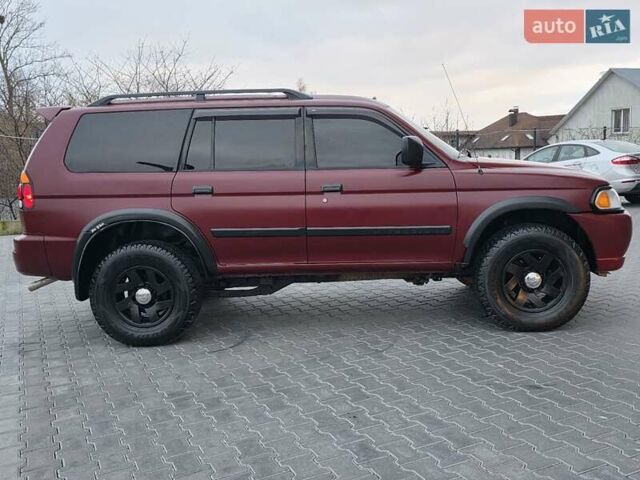 Красный Мицубиси Монтеро, объемом двигателя 3 л и пробегом 155 тыс. км за 5333 $, фото 11 на Automoto.ua