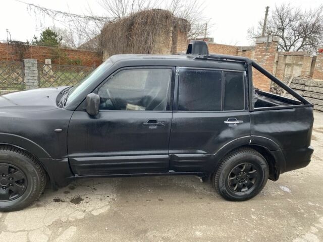 Серый Мицубиси Монтеро, объемом двигателя 3.2 л и пробегом 300 тыс. км за 5500 $, фото 2 на Automoto.ua