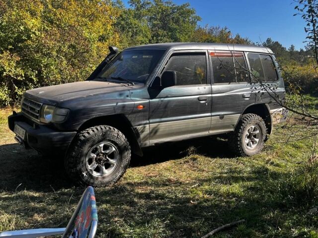 Зеленый Мицубиси Монтеро, объемом двигателя 3 л и пробегом 300 тыс. км за 5999 $, фото 1 на Automoto.ua