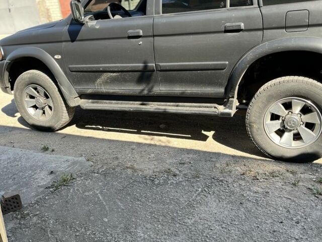 Черный Мицубиси Натива, объемом двигателя 3 л и пробегом 190 тыс. км за 5000 $, фото 1 на Automoto.ua