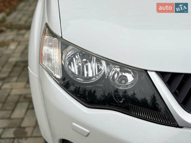 Белый Мицубиси Аутлендер ХЛ, объемом двигателя 3 л и пробегом 216 тыс. км за 10500 $, фото 21 на Automoto.ua