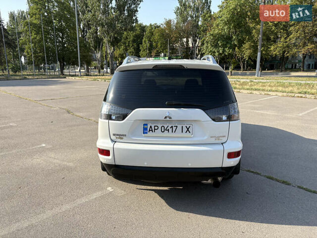 Белый Мицубиси Аутлендер ХЛ, объемом двигателя 2.36 л и пробегом 155 тыс. км за 10950 $, фото 11 на Automoto.ua